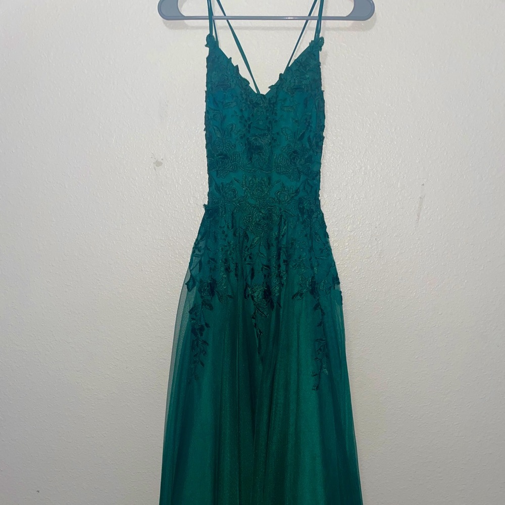 This dress fits true to size and has beautiful lace details and no damage